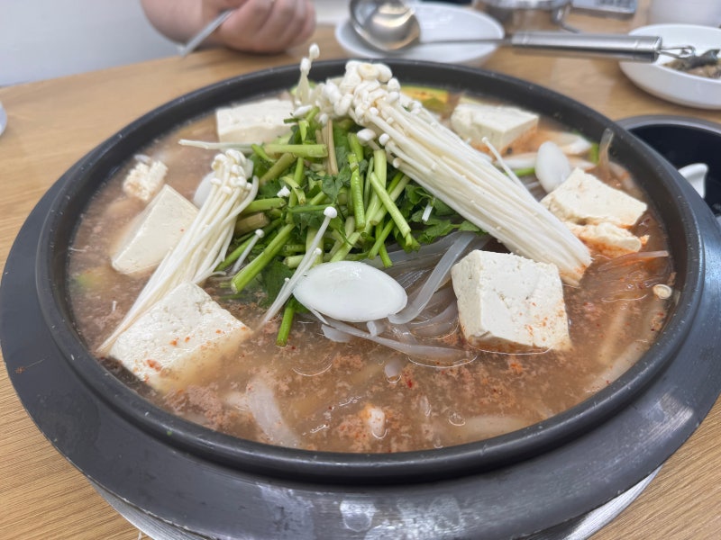 Bulnak jeongol with beef, tofu, mushrooms, noodles, and vegetables